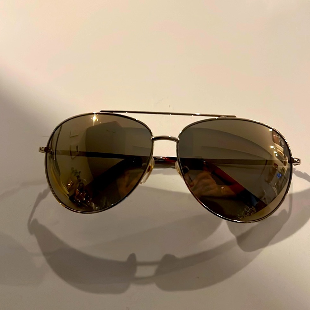 Michael Kors used Sunglasses. Gold frame and brownish lens.